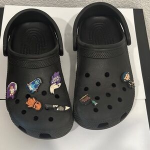 CROCS Black with Halloween charms.